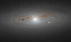 哈勃望远镜带来的惊喜，一个“尘土飞扬”的 NGC 4036 星系